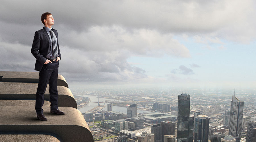 Person Standing on Top of Building Person Standing on Top of Building